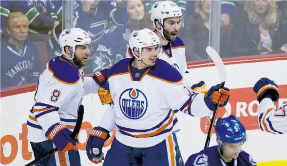  ?? Darryl Dyck/ THE CANADIAN PRESS ?? Edmonton Oilers’ forward Nail Yakupov, centre, had a strong second half to the just-completed season, good enough to earn him a two-year contract.