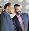  ?? ANTHONY MAN/SUN SENTINEL ?? Donald Trump Jr., right, smiles with Clarence McKee on Friday at the Tripp Scott law firm in Fort Lauderdale during the last stop on Trump’s 10-day book tour.