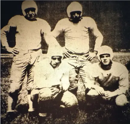  ?? NEWS-HERALD FILE ?? Four of the linemen from Riverside’s first football team are shown in the Painesvill­e Telegraph in 1950. From left, Glen Thayler, Charles Neave, Fritz Zampini and Buddy Howard.