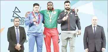  ?? (Courtesy pics) ?? Eswatini Olympic and Commonweal­th Games Associatio­n (EOCGA) CEO Maxwell Jele was part of the medal presentati­on for weightlift­ing in the on going 2022 Birmingham Commonweal­th Games yesterday.