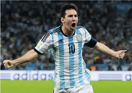  ?? MATTHIAS HANGST/ GETTY IMAGES ?? Argentina’s Lionel Messi celebrates after scoring his team’s second goal during Argentina’s World Cup Group F match against Bosnia- Herzegovin­a on Monday at the Maracana in Rio de Janeiro. Argentina eked out a narrow 2- 1 win.