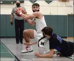  ?? OWEN MCCUE - MEDIANEWS GROUP ?? Methacton’s Mike Merola, left, looks to pass after securing a loose ball from CB South’s Tyler Meinel.