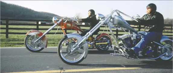  ?? DISCOVERY CHANNEL ?? Ride for the ages: American Chopper's Paul Teutul Jr., left, and Paul Sr. know a thing or two about the stripped down bikes that achieved icon status in the 1960s and '70s.