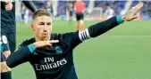  ?? AP ?? Sergio Ramos of Real Madrid celebrates after scoring his side’s third goal against Leganes during a Spanish league match at the Butarque Stadium in Leganes, outside Madrid, on Wednesday. Madrid won 3-1. —