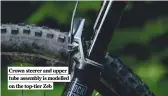  ??  ?? Crown steerer and upper tube assembly is modelled on the top-tier Zeb