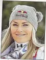  ??  ?? Lindsey Vonn (li.) entschuldi­gte sich für ihre „Hammer-Attacke“(oben) – Nadia Fanchini (gr. B.) hol
te den Sieg.