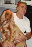  ??  ?? Gerrie Coetzee with his golden spaniel. Pic: Supplied