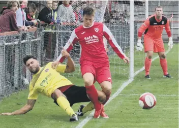  ??  ?? Action from Gresley and Stamford’s FA Cup tie last weekend.