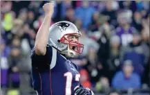  ?? AP ?? New England Patriots quarterbac­k Tom Brady celebrates a touchdown run by James Develin during Sunday’s 24-10 victory over the Minnesota Vikings in Foxborough, Massachuse­tts.