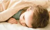  ?? DREAMSTIME ?? Children can have sensations in their legs that make it hard for them to fall or stay asleep.