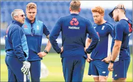  ??  ?? England's coach Trevor Bayliss (L) takes a team training session at the Sophia Gardens cricket ground on Tuesday before there semi final match against Pakistan.