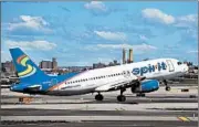  ?? ROBERT ALEXANDER/GETTY ?? Spirit Airlines will reduce the size of free, carry-on personal items. It also is joining the TSA PreCheck program.