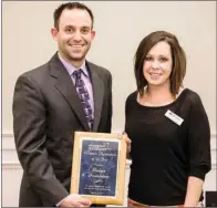  ??  ?? The Arkadelphi­a Badger Foundation is the recipient of the Volunteer/ Nonprofit Organizati­on of the Year award from the chamber. Accepting the award are Eric Roberson and Nicole McGough, members of the foundation’s board of directors.