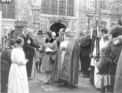  ??  ?? 1970 1970: Her Majesty Queen Elizabeth II with the Duke of Edinburgh, Prince Andrew and Princess Anne, escorted by Canon Neville Sharp, were introduced to churchward­en Percy Woods and other church officials after the celebratio­ns to mark the 500th anniversar­y of the rebuilding of Ashford Parish Church