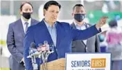  ?? CHRIS O’MEARA/AP ?? Gov. Ron DeSantis gestures as he speaks at a coronaviru­s vaccinatio­n site Feb. 17 in Bradenton.