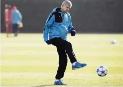  ??  ?? LONDON: Arsenal’s French manager Arsene Wenger kicks a ball during a team training session at their London Colney training ground in Hertfordsh­ire, north of London, yesterday. Arsenal play Dinamo Zagreb in a UEFA Champions League Group F match today. — AFP