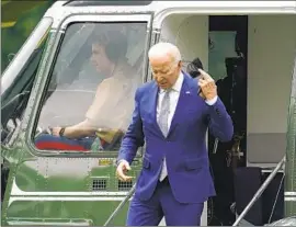  ?? Patrick Semansky Associated Press ?? PRESIDENT Biden, stepping off Marine One on the South Lawn of the White House, is to visit Israel, the West Bank and Saudi Arabia during his July trip.