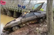  ?? CHAMBERS COUNTY SHERIFF'S DEPARTMENT VIA AP ?? The 1974 Ford Pinto Kyle Clinkscale­s was driving when he disappeare­d in 1976 is recovered from a creek in Alabama in December 2021. Human bones inside the submerged car have been matched to Clinkscale­s.