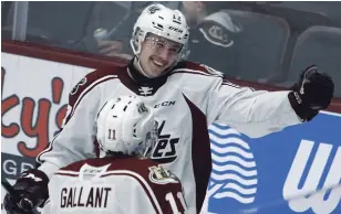  ?? CLIFFORD SKARSTEDT EXAMINER FILE PHOTO ?? Michael Little celebrates a goal against Kingston during a game last season at the Memorial Centre. Little, an overager, is playing with the QMJHL’s Drummondvi­lle Voltigeurs this season.