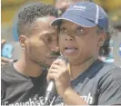  ?? ANTHONY VAZQUEZ/SUN-TIMES ?? Thomas Gaston and Yasmine Miller, parents of 20-month-old Sincere Gaston, at a vigil last week.