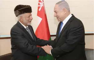  ?? (Amos Ben-Gershom/GPO) ?? PRIME MINISTER Benjamin Netanyahu meets with Omani Foreign Minister Yousuf bin Alawi bin Abdullah in Warsaw yesterday.