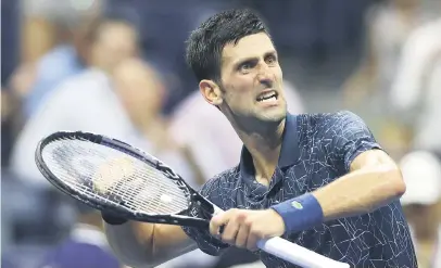  ?? Picture: AFP ?? ON TRACK. Novak Djokovic (abo ve) celebrates after beating giant-killer John Millman in the quarterfin­als of the US Open in New York on Wednesday.