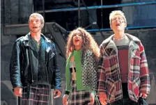  ?? Photos by Sara Krulwich, © The New York Times Co. ?? From left: Adam Pascal, Daphne Rubin and Anthony Rapp perform in “Rent” in New York, in January 1996.