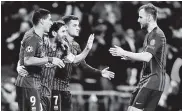  ?? AFP ?? Messi celebrando junto a Suárez, Coutinho y Rakitic.