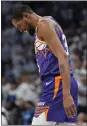  ?? ABBIE PARR – THE ASSOCIATED PRESS ?? Phoenix Suns forward Kevin Durant walks across the court during the first half of Game 1 against the Minnesota Timberwolv­es, Saturday, April 20. in Minneapoli­s.