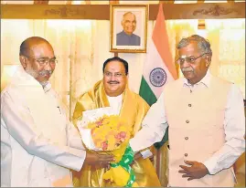  ?? ?? Chief minister Biren Singh with BJP president JP Nadda and Manipur governor La Ganesan.