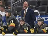  ?? DAVID BECKER — THE ASSOCIATED PRESS ?? Peter DeBoer, top center, the fourth coach to lose his job following the 2021-22season, failed to guide the Vegas Golden Knights into the playoffs, a first for the club.