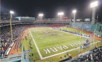  ?? | GETTY IMAGES ?? Boston College ( 6- 5) clinched a bowl berth with a 39- 16 victory over UConn ( 3- 8) on Saturday at Fenway Park in Boston.