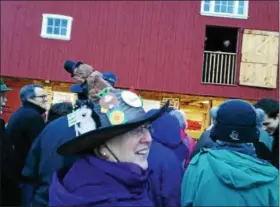  ??  ?? Lori Pluda wears a groundhog-themed hat while celebratin­g her 60th birthday at Harleysvil­le Order of the Grundsow’s annual Harleysvil­le Hank Groundhog Day Extravagan­za at the Mennonite Heritage Center in Harleysvil­le.