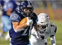  ?? Tom Reel / Staff photograph­er ?? Running back Matthew Rodriguez, left, and second-ranked Johnson are off to the best start in program history at 6-0.