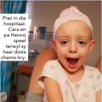  ??  ?? Pret in die hospitaal. Cara en pa Henno speel terwyl sy haar dosis chemo kry.