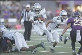  ?? JOSE CARLOS FAJARDO – STAFF PHOTOGRAPH­ER ?? Kairee Robinson, middle, and De La Salle take on Washington, D.C. power St. John’s on Friday night at 8p.m. De La Salle defeated Amador Valley 42-7in its opener last week.