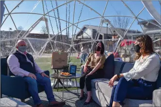  ?? SUBMITTED PHOTO ?? Residents of King of Prussia enjoy the ambiance of an igloo, specially created for Restaurant Week.