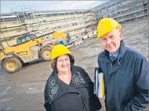  ?? Picture: Chris Watt. ?? Karen McKechnie of Abbotsford Care with Stuart Francksen of Bank of Scotland at the Raith Manor developmen­t in Kirkcaldy.