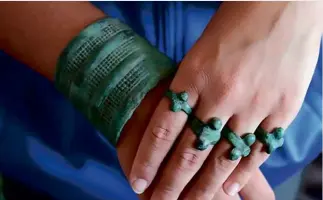  ?? ?? ABOVE LEFT: The scarf is blowing upwards due to the gusts of air issuing vigorously from a blowhole at Wupatki. ABOVE RIGHT: Some of the bronze rings and the bracelet of the 2,800-year-old Siberian ‘Lady of the Rings’.