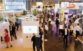  ??  ?? PARIS: People walk at the Vivatech, a gadgets show. — AP