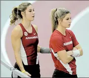  ?? NWA Democrat-Gazette/ANDY SHUPE ?? Arkansas pole vaulters Lexi (left) and Tori Weeks will have a hectic schedule over the next few months. The twins will not only compete in track and field championsh­ips this week and in August, but both also plan on have weddings later in the summer.