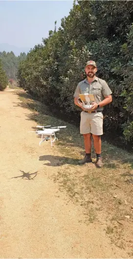  ??  ?? RIGHT: Marloe van Niekerk, production manager at Anro Boerdery, prepares to fly a drone over the macadamia orchards.