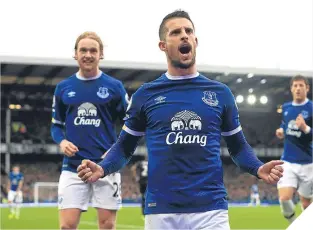  ??  ?? ■
Kevin Mirallas celebrates scoring his side’s opening goal.