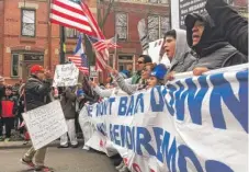  ??  ?? Thousands of marchers supporting immigrants’ rights head down Jackson in Chicago Thursday afternoon.
| STEFANO ESPOSITO/ SUN- TIMES