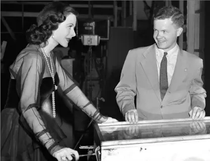  ?? Associated Press ?? Hedy Lamarr shoots pinball with Associated Press reporter Bob Thomas, who reported on the comings and goings of Hollywood’s biggest stars. “THE ONLY WOMAN IN THE ROOM” By Marie Benedict Sourcebook­s Landmark $25.99