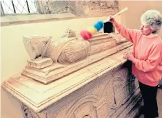  ??  ?? Duster to dust: a tomb in St Mary’s Priory church in Abergavenn­y, Monmouthsh­ire