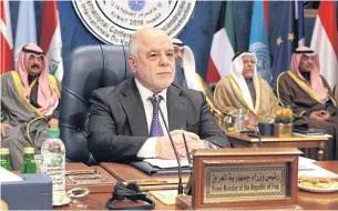  ??  ?? Iraqi Prime Minister Haider al-Abadi prepares for a donor’s summit at Bayan Palace in Kuwait City on Wednesday.