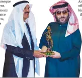  ?? ?? Khaled Al-Malik, chairman of the Saudi Journalist­s Associatio­n, honored for his exceptiona­l media career.