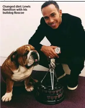  ??  ?? Changed diet: Lewis Hamilton with his bulldog Roscoe