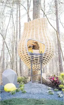  ??  ?? Chris Wade designed and built this honeycomb-inspired reading pod for a book-loving client.